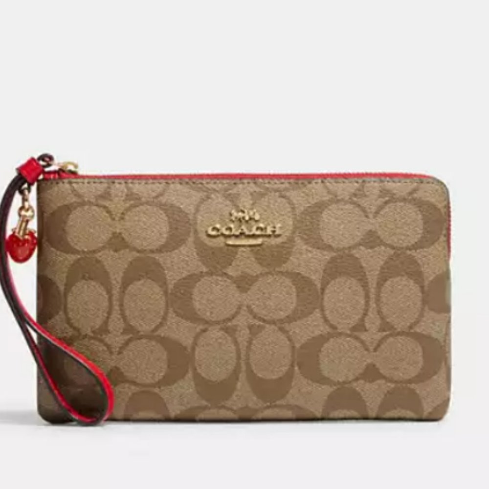 Coach - Large Corner Zip Wristlet In Signature Canvas with electric red